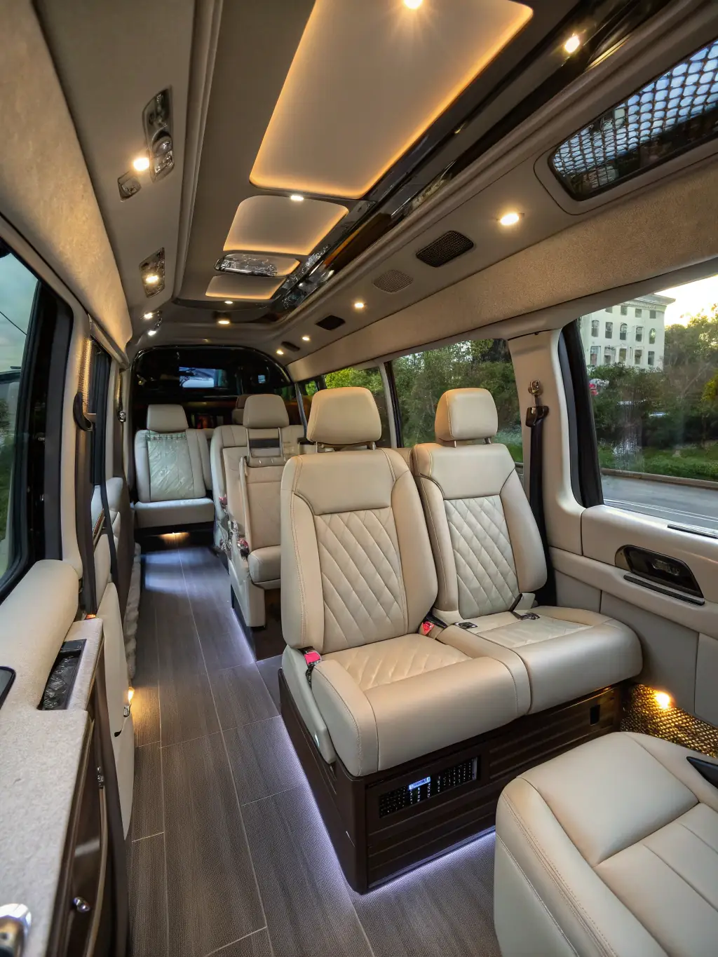 A minivan with entertainment systems, multiple charging ports, and comfortable seating arrangements, showcasing features that keep kids entertained and connected on long trips.